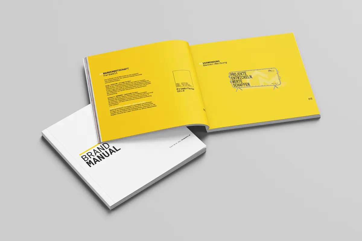 M RED — Brand Manual als Buch-Mockup mit Cover und Farbwelt-Seite