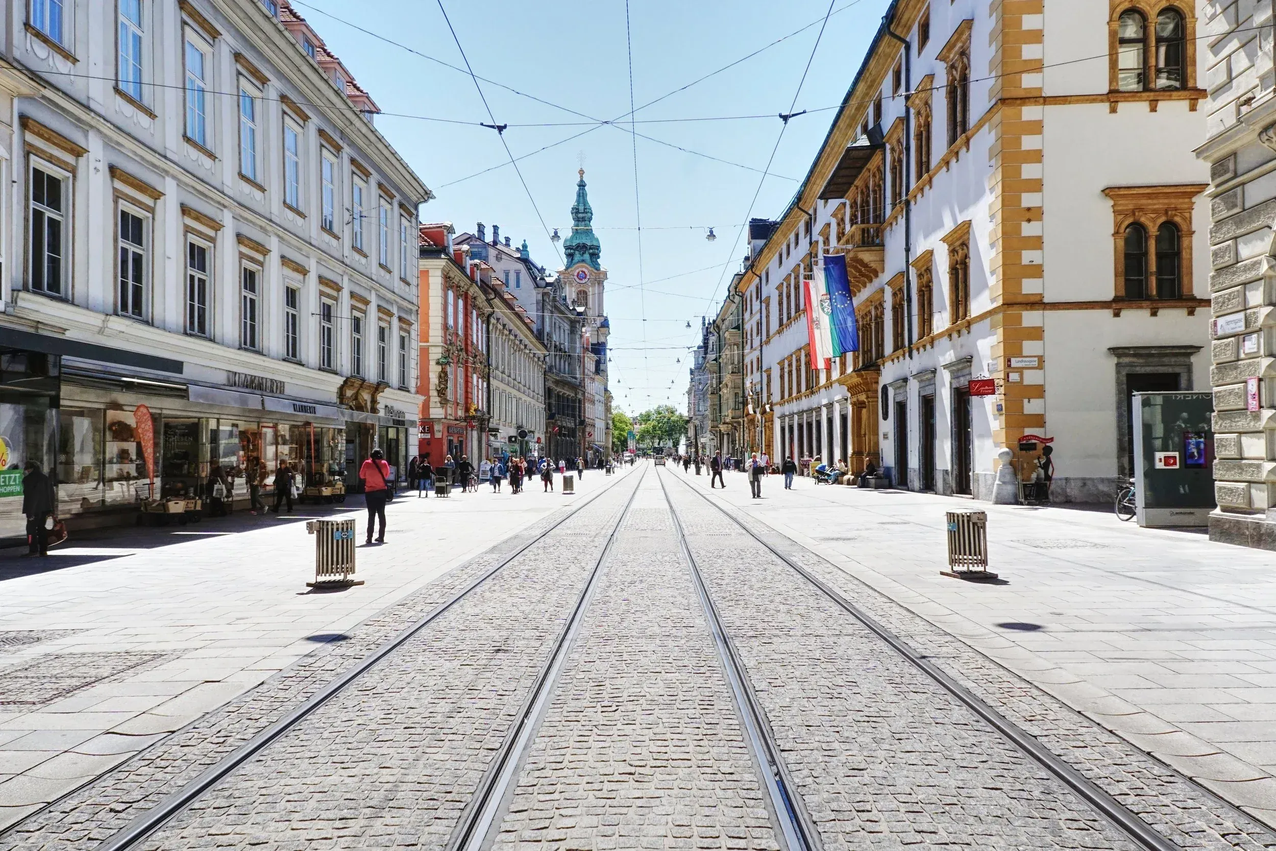 Herrengasse Graz today — tram tracks, little vegetation, dominated by street space